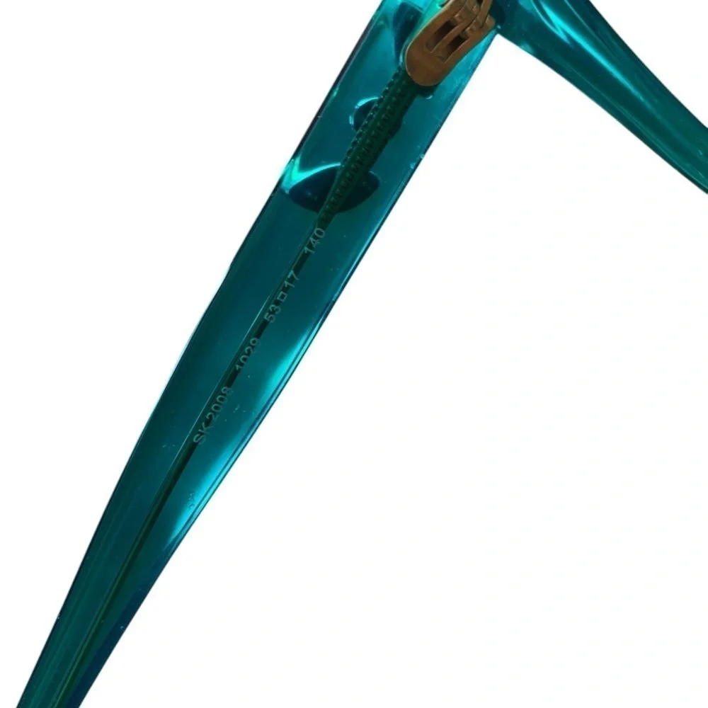 Swarovski green glasses